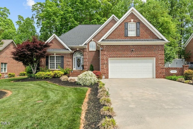 view of front facade with concrete driveway, brick siding, and a front lawn