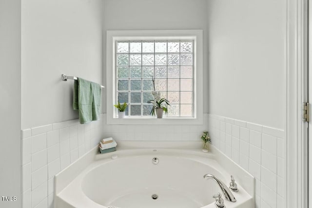 bathroom featuring a bath