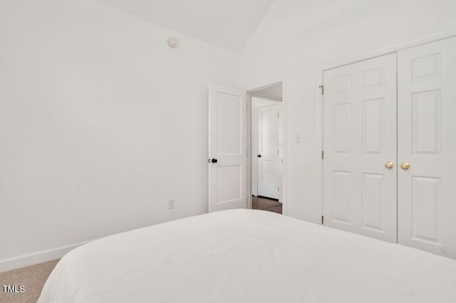 100 Bradborne Cir, Clayton, NC 27520 - carpeted bedroom with baseboards and vaulted ceiling