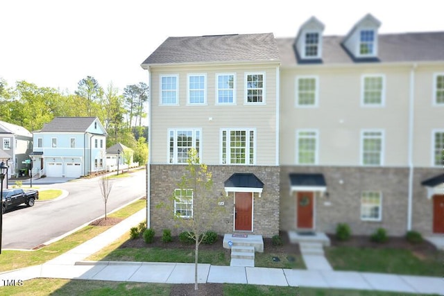 1020 Kentlands Dr, Durham, NC 27713 - view of property featuring driveway, a residential view, and a garage