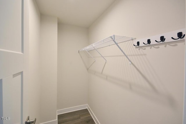 1020 Kentlands Dr, Durham, NC 27713 - walk in closet with dark wood-style floors