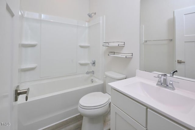 1020 Kentlands Dr, Durham, NC 27713 - full bath featuring shower / washtub combination, toilet, vanity, and wood finished floors