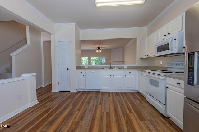 5209 Echo Ridge Rd, Raleigh, NC 27612 - kitchen featuring white appliances, dark wood finished floors, a sink, white cabinets, and light countertops