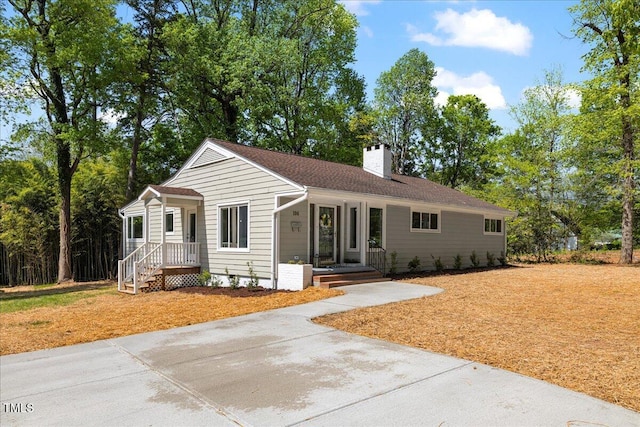 106 Circle Dr, Mebane, NC 27302 - single story home with a chimney