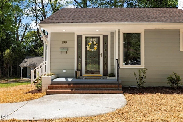 106 Circle Dr, Mebane, NC 27302 - property entrance with a porch and a shingled roof