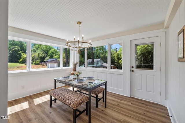 106 Circle Dr, Mebane, NC 27302 - dining room featuring a wealth of natural light, a notable chandelier, and wood finished floors