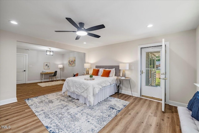 106 Circle Dr, Mebane, NC 27302 - bedroom with baseboards, wood finished floors, access to exterior, and recessed lighting