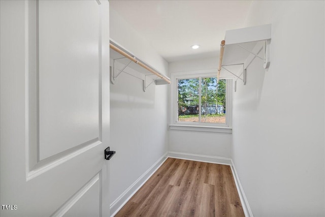 106 Circle Dr, Mebane, NC 27302 - spacious closet featuring wood finished floors