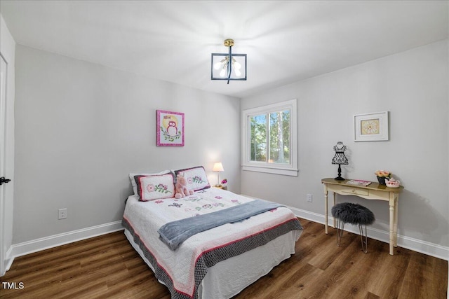 106 Circle Dr, Mebane, NC 27302 - bedroom with baseboards and wood finished floors