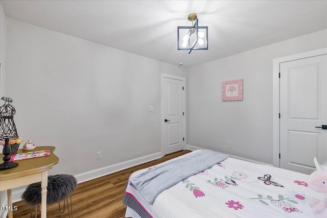 106 Circle Dr, Mebane, NC 27302 - bedroom featuring wood finished floors and baseboards