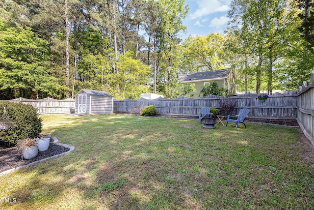 5413 Botany Bay Dr, Raleigh, NC 27616 - view of yard featuring a shed, a fenced backyard, and an outbuilding