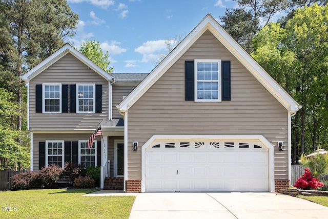 5413 Botany Bay Dr, Raleigh, NC 27616 - traditional-style house with concrete driveway, brick siding, a front lawn, and a shingled roof