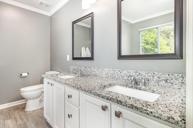5413 Botany Bay Dr, Raleigh, NC 27616 - full bath featuring visible vents, ornamental molding, a sink, and toilet