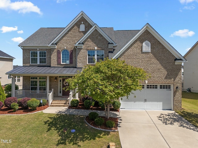 316 Hilliard Forest Dr, Cary, NC 27519 - view of front of property with brick siding, a porch, a front lawn, and concrete driveway