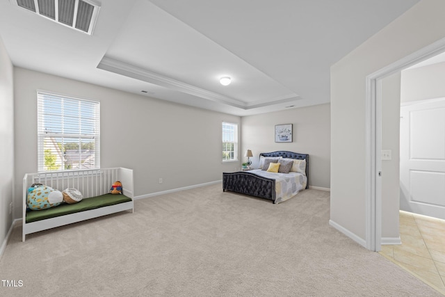 316 Hilliard Forest Dr, Cary, NC 27519 - bedroom with a tray ceiling, visible vents, carpet flooring, and baseboards