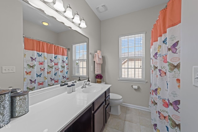 316 Hilliard Forest Dr, Cary, NC 27519 - bathroom featuring tile patterned floors, visible vents, toilet, vanity, and baseboards
