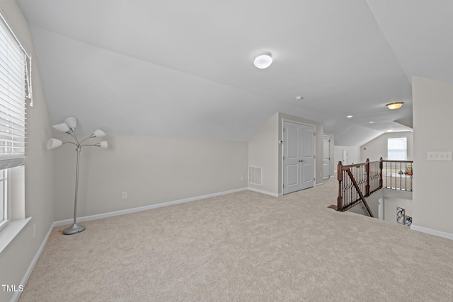 316 Hilliard Forest Dr, Cary, NC 27519 - additional living space with carpet floors, vaulted ceiling, visible vents, and baseboards