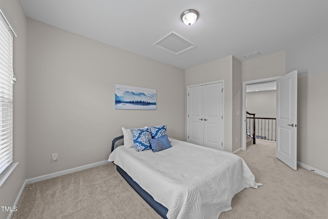 316 Hilliard Forest Dr, Cary, NC 27519 - bedroom with attic access, baseboards, multiple windows, and light colored carpet