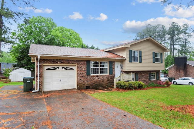 3309 Teal Dr SW, Wilson, NC 27893 - split level home featuring a garage, aphalt driveway, brick siding, and a front yard