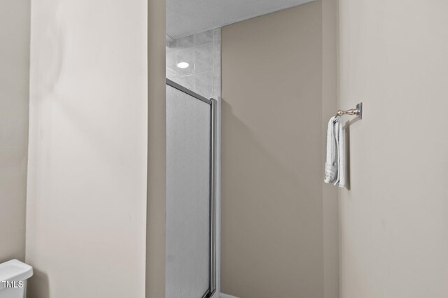 3309 Teal Dr SW, Wilson, NC 27893 - bathroom featuring a stall shower