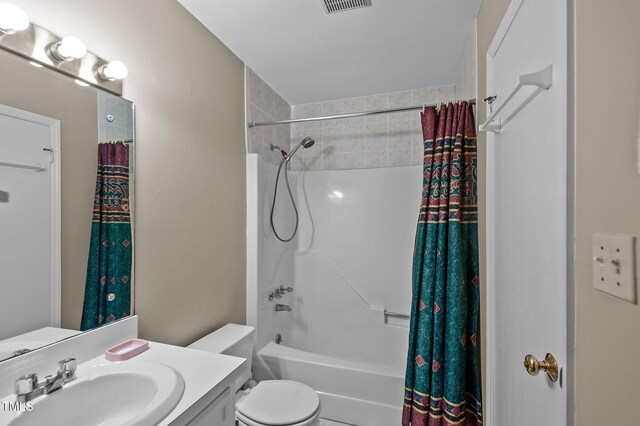 3309 Teal Dr SW, Wilson, NC 27893 - bathroom featuring shower / tub combo, toilet, vanity, and visible vents