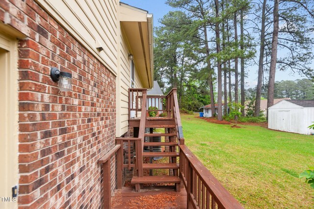 3309 Teal Dr SW, Wilson, NC 27893 - view of yard featuring a shed, stairway, and an outbuilding
