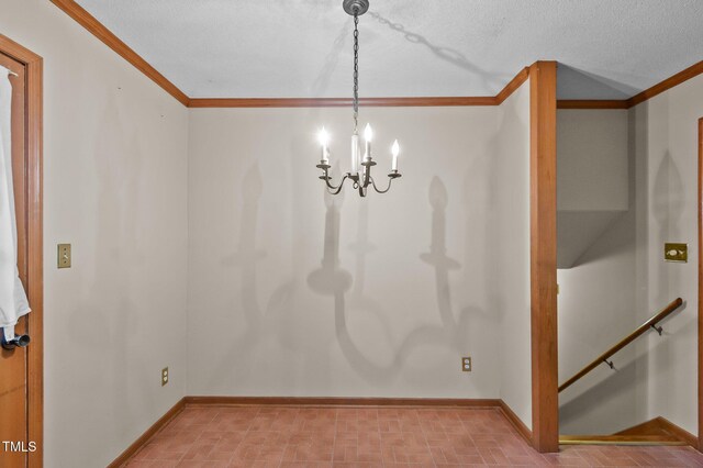 3309 Teal Dr SW, Wilson, NC 27893 - unfurnished dining area featuring an inviting chandelier, baseboards, and crown molding