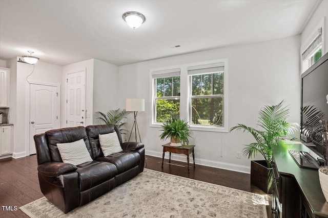 1041 Cotulla Dr, Morrisville, NC 27560 - living area with baseboards, dark wood-style flooring, and visible vents