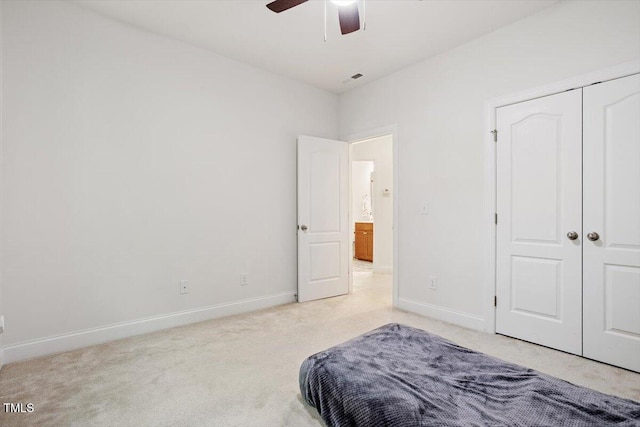 1041 Cotulla Dr, Morrisville, NC 27560 - bedroom featuring baseboards, a ceiling fan, a closet, and light carpet