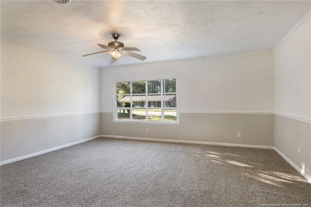 6506 Sprucewood Rd, Fayetteville, NC 28304 - empty room featuring crown molding, carpet floors, ceiling fan, and baseboards