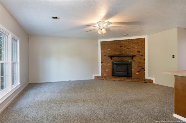 6506 Sprucewood Rd, Fayetteville, NC 28304 - unfurnished living room featuring carpet, visible vents, and a healthy amount of sunlight