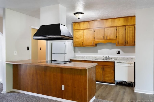 6506 Sprucewood Rd, Fayetteville, NC 28304 - kitchen featuring a sink, light countertops, premium range hood, white appliances, and brown cabinets