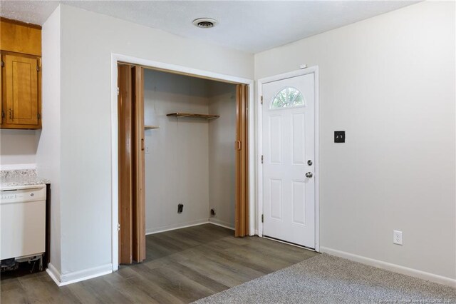 6506 Sprucewood Rd, Fayetteville, NC 28304 - entryway featuring visible vents, baseboards, and dark wood finished floors