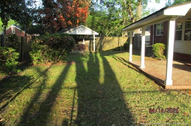 203 W 16th St, Lumberton, NC 28358 - view of yard with a patio, a gazebo, and fence
