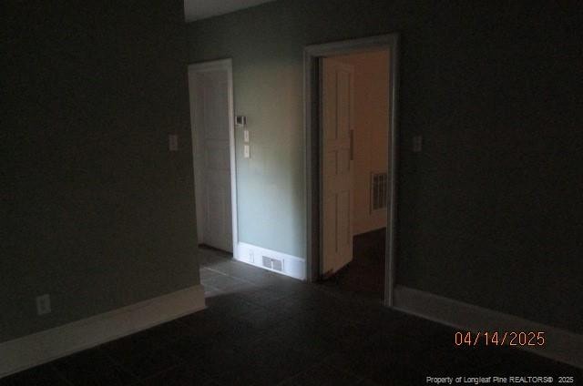 203 W 16th St, Lumberton, NC 28358 - empty room featuring visible vents and baseboards