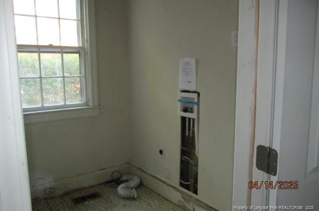 203 W 16th St, Lumberton, NC 28358 - interior space featuring visible vents, electric dryer hookup, and laundry area