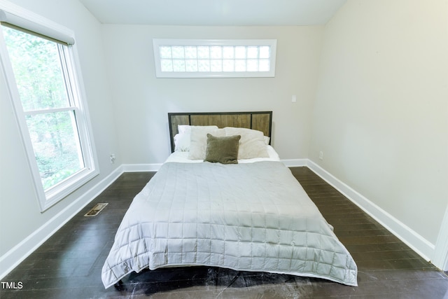 6409 Lakeland Dr, Raleigh, NC 27612 - bedroom with wood finished floors and baseboards