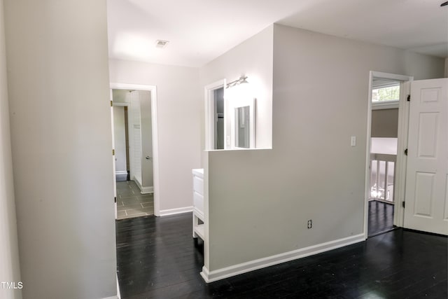 6409 Lakeland Dr, Raleigh, NC 27612 - hallway with dark wood finished floors and baseboards