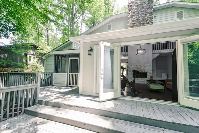 6409 Lakeland Dr, Raleigh, NC 27612 - wooden terrace featuring a sunroom