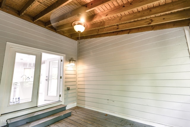 6409 Lakeland Dr, Raleigh, NC 27612 - spare room featuring hardwood / wood-style floors, wooden ceiling with exposed beams, and wooden walls