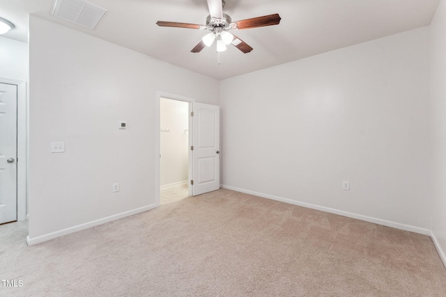 2027 Hayes Ln, Holly Springs, NC 27540 - unfurnished bedroom featuring light carpet, baseboards, and a ceiling fan