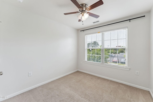 2027 Hayes Ln, Holly Springs, NC 27540 - carpeted spare room with baseboards and a ceiling fan