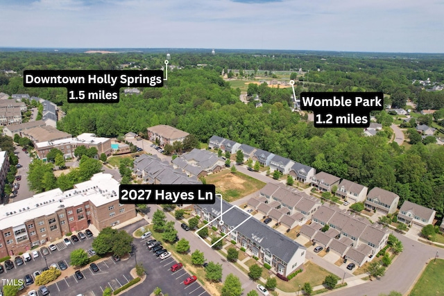2027 Hayes Ln, Holly Springs, NC 27540 - aerial overview of property's location with nearby suburban area