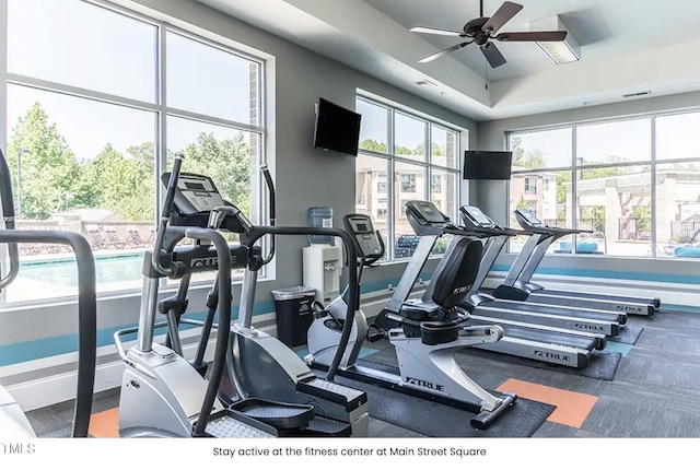 2027 Hayes Ln, Holly Springs, NC 27540 - workout area featuring a ceiling fan and baseboards