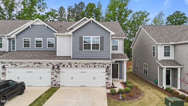 2211 Cherry Top Dr, Fuquay Varina, NC 27526 - view of front of property with a garage, board and batten siding, a shingled roof, and driveway