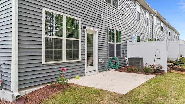 2211 Cherry Top Dr, Fuquay Varina, NC 27526 - exterior space with central air condition unit, fence, a patio, and a yard