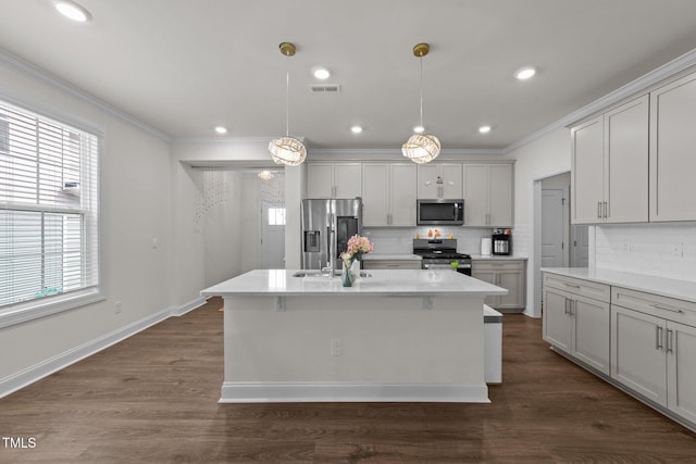 2211 Cherry Top Dr, Fuquay Varina, NC 27526 - kitchen with crown molding, decorative backsplash, appliances with stainless steel finishes, and visible vents