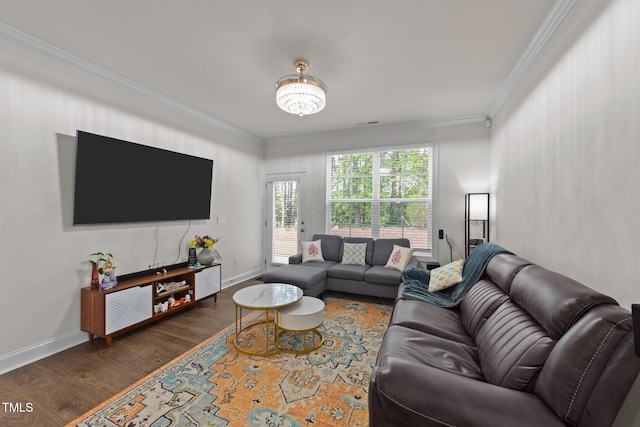 2211 Cherry Top Dr, Fuquay Varina, NC 27526 - living area featuring baseboards, ornamental molding, wood finished floors, and visible vents