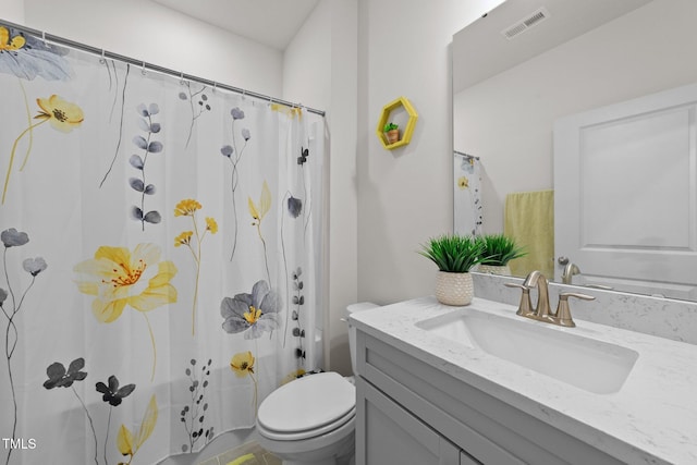 2211 Cherry Top Dr, Fuquay Varina, NC 27526 - full bathroom with visible vents, shower / bath combo with shower curtain, toilet, and vanity