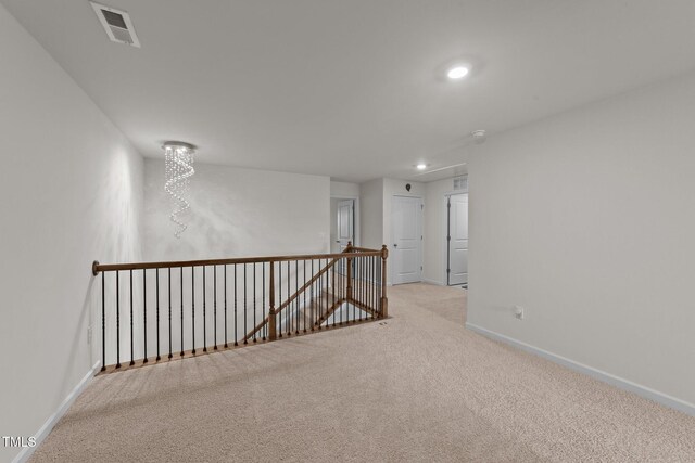 2211 Cherry Top Dr, Fuquay Varina, NC 27526 - spare room with visible vents, carpet floors, baseboards, an inviting chandelier, and recessed lighting